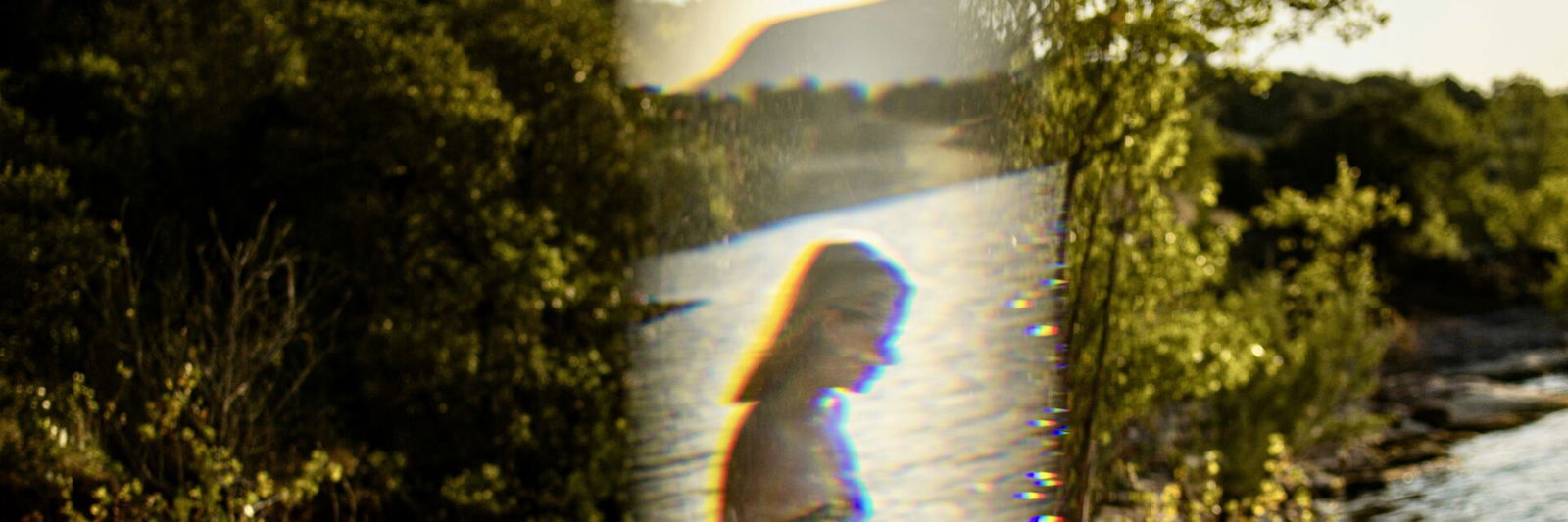 Figure of person in nature obscured
