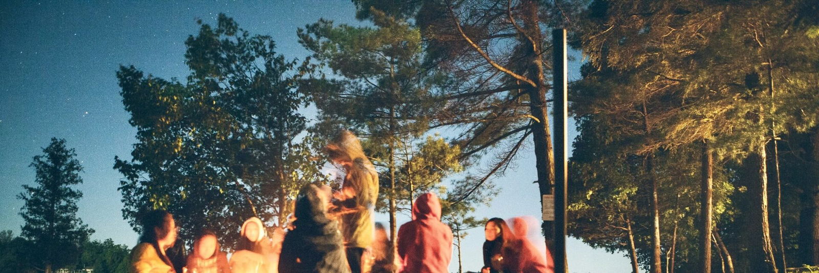 People gathered around a campfire