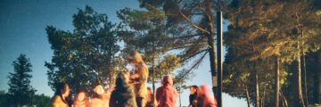 People gathered around a campfire